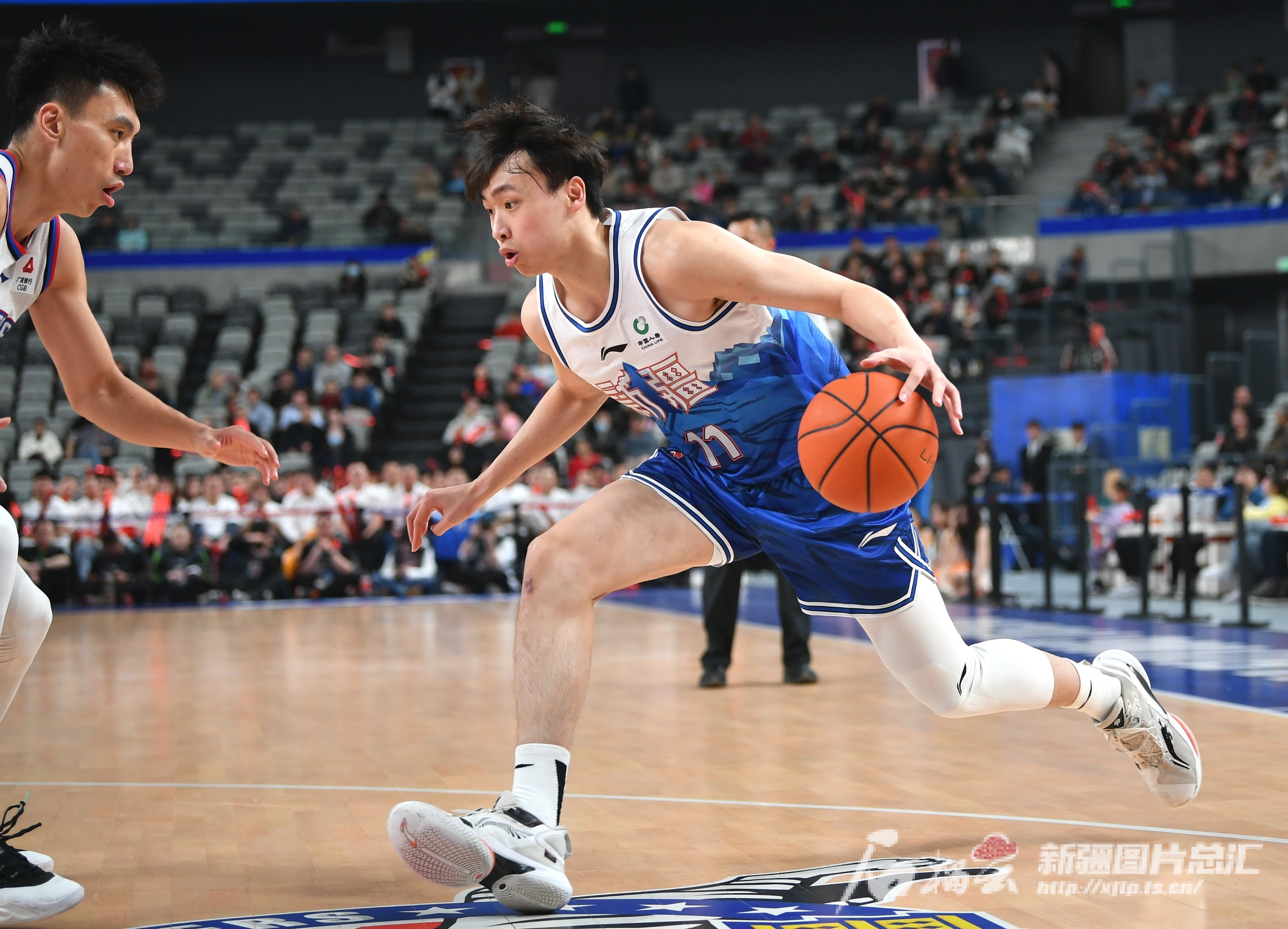 威廉希尔app-新疆男篮大胜广州队，晋级决赛